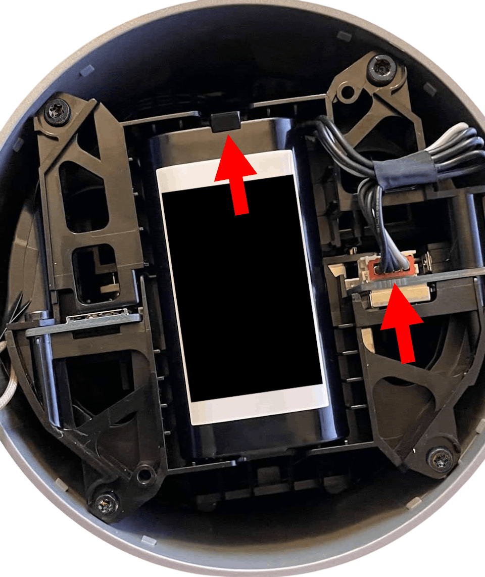 Release the clips securing the battery, and remove it from the device