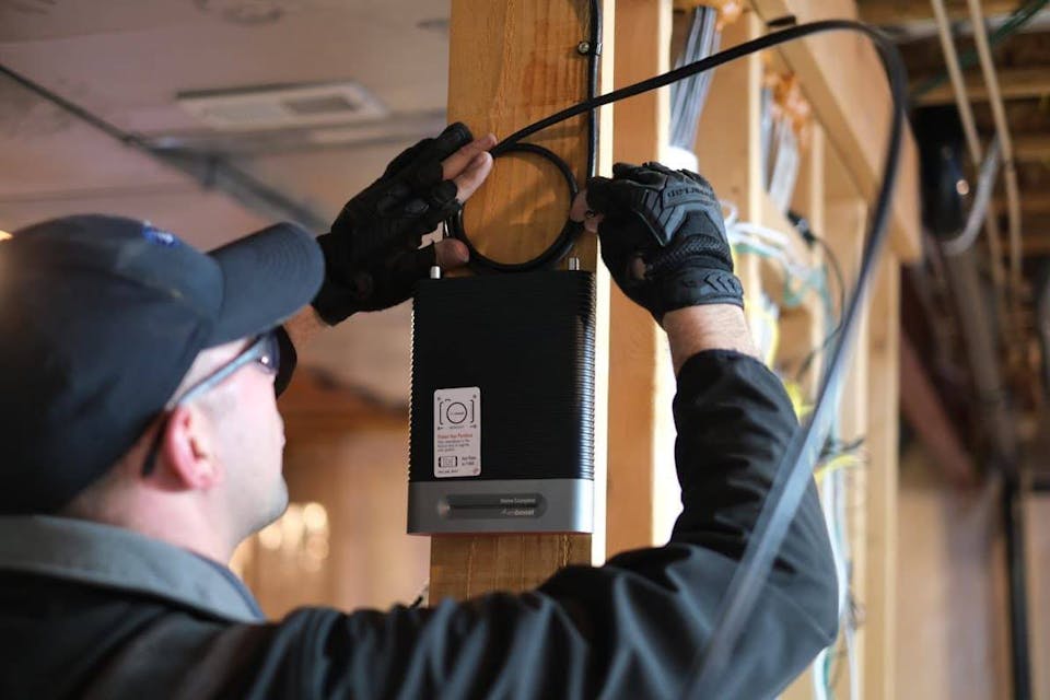 Technician carrying out installation